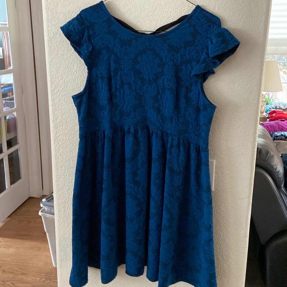 Plus size skater dress with cap sleeves and tie back